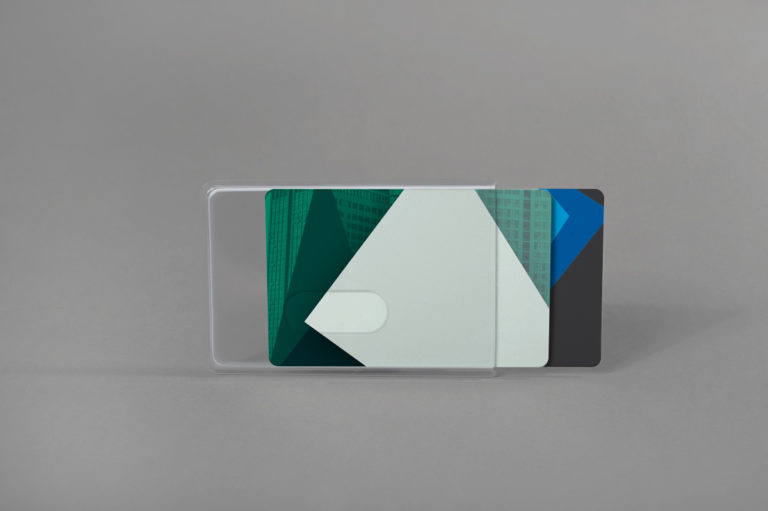 Robust rigid card holder with finger slot design for two cards